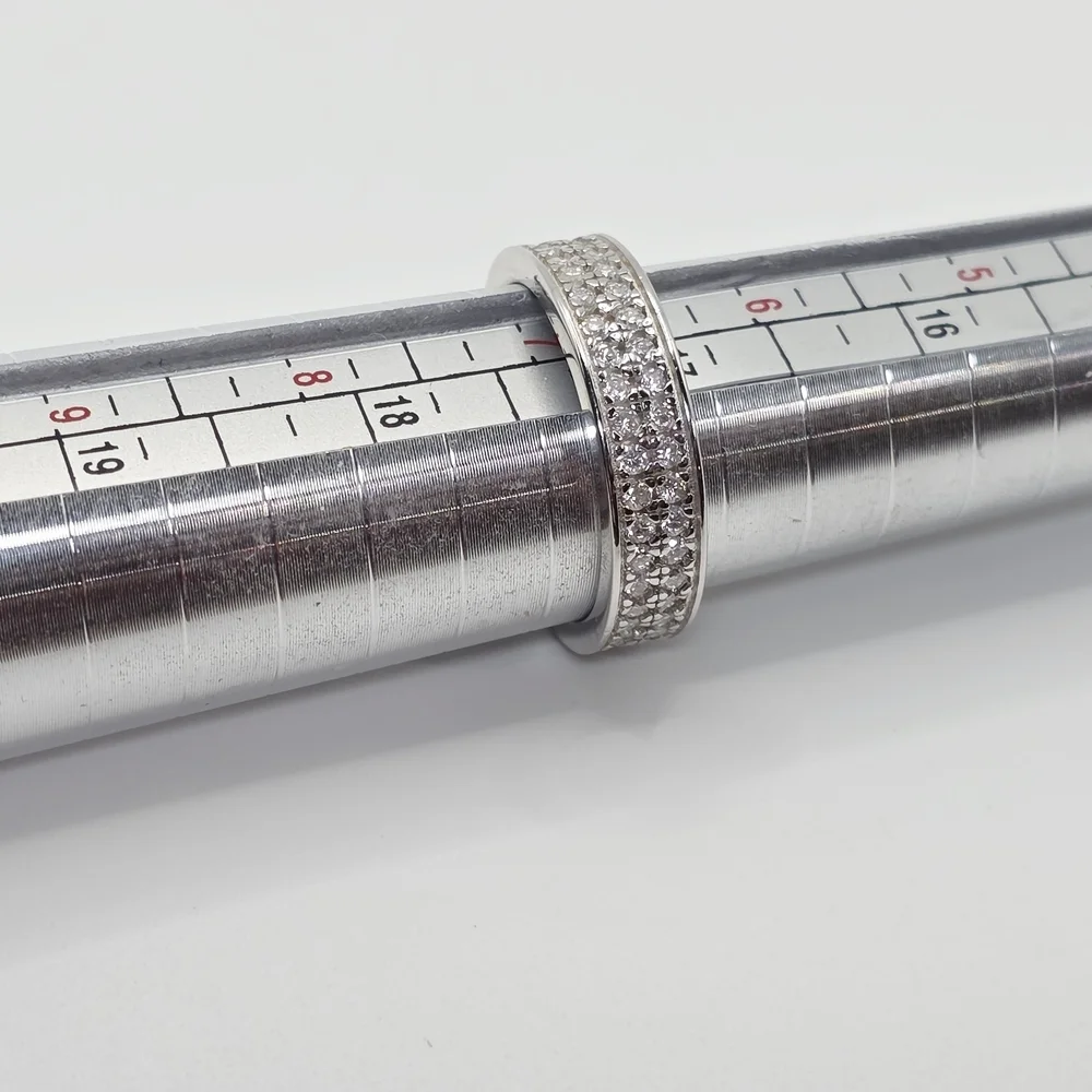 This is a 2 Row Moissanite Diamonds Band . S925 Silver. vvs1 D. size 7